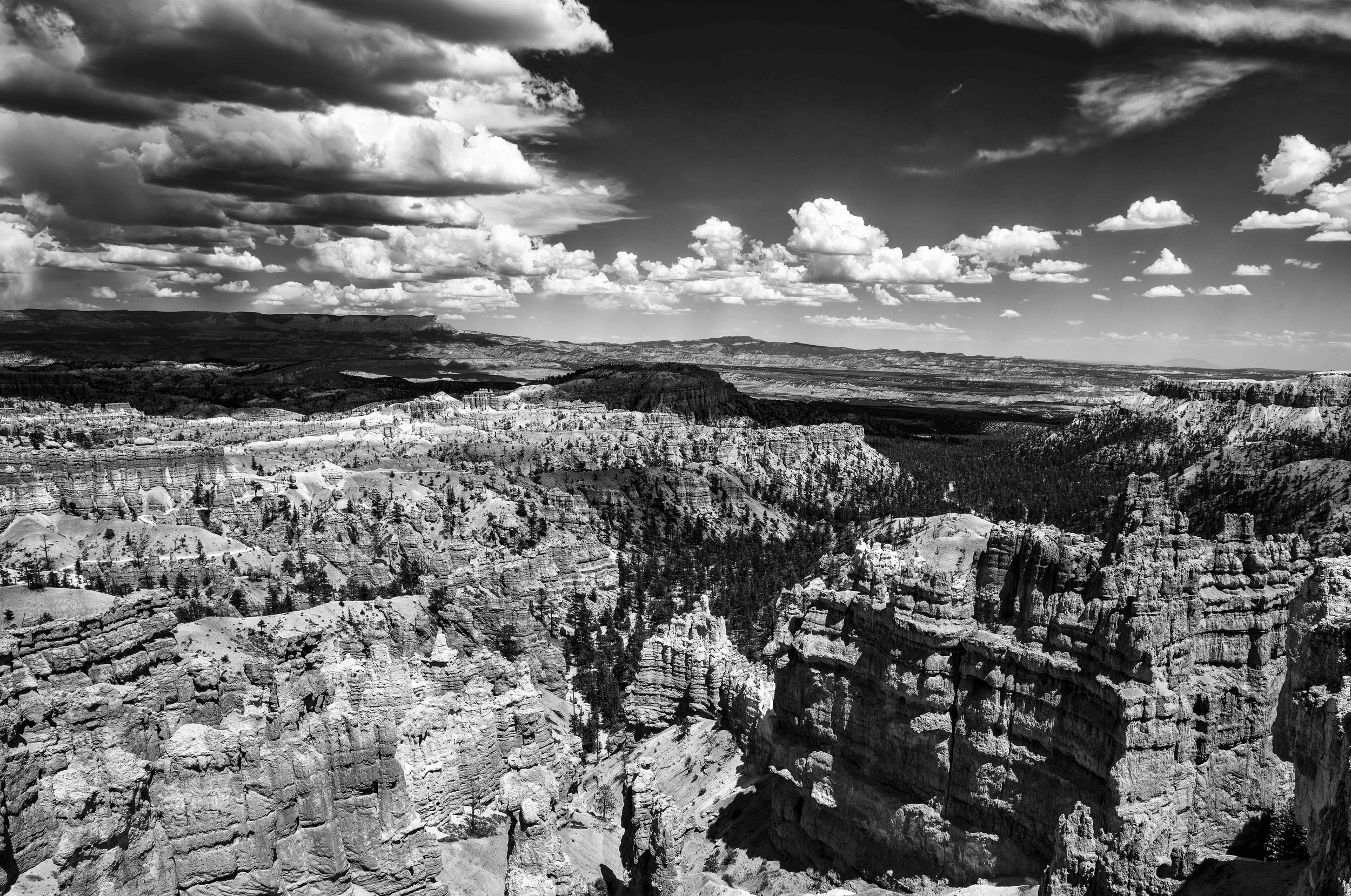 Bryce Canyon Skies.
Layered hoodoos stretch toward the horizon beneath a sky filled with movement and light.