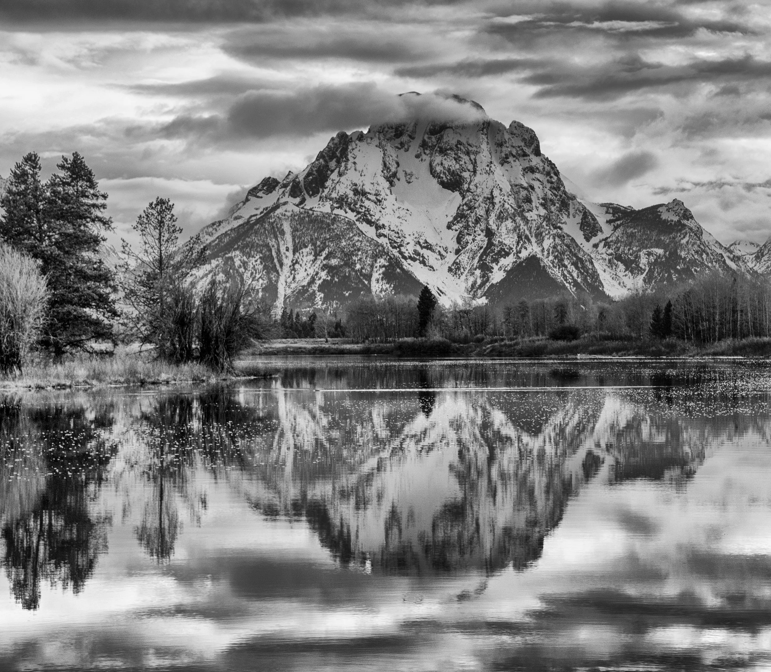 Grand Teton Reflection
The Tetons appear twice—once above the horizon and again in the quiet water below.