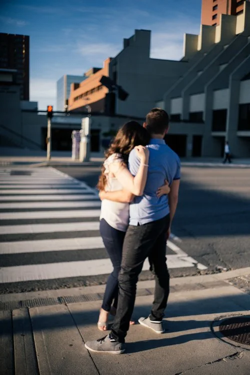 couple+hugging+in+street.jpg