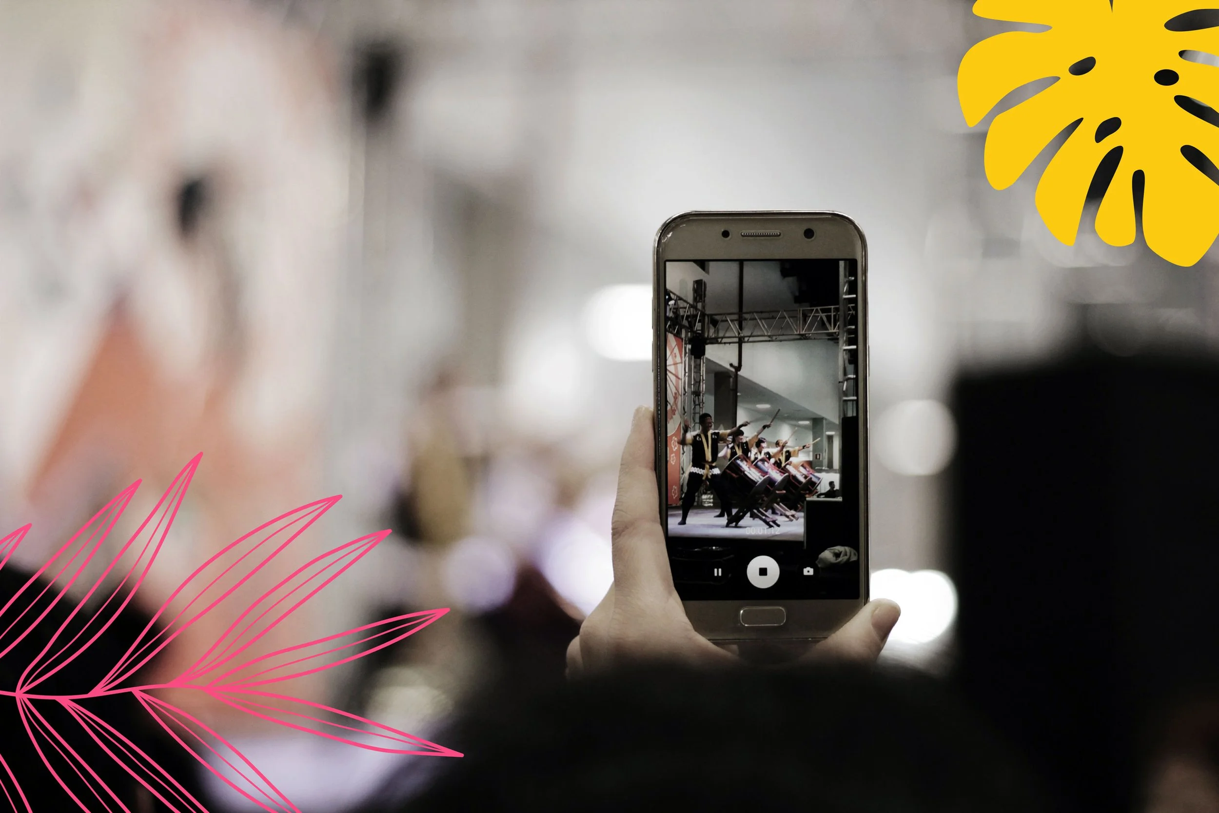 Image of a phone recording a video, the image is adorned with leaves that correspond to Andrea's style