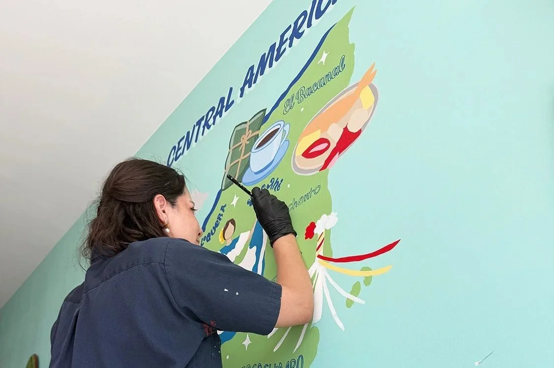 Indoor mural by AndreaCataRo showing how a custom mural can transform a business or interior space.