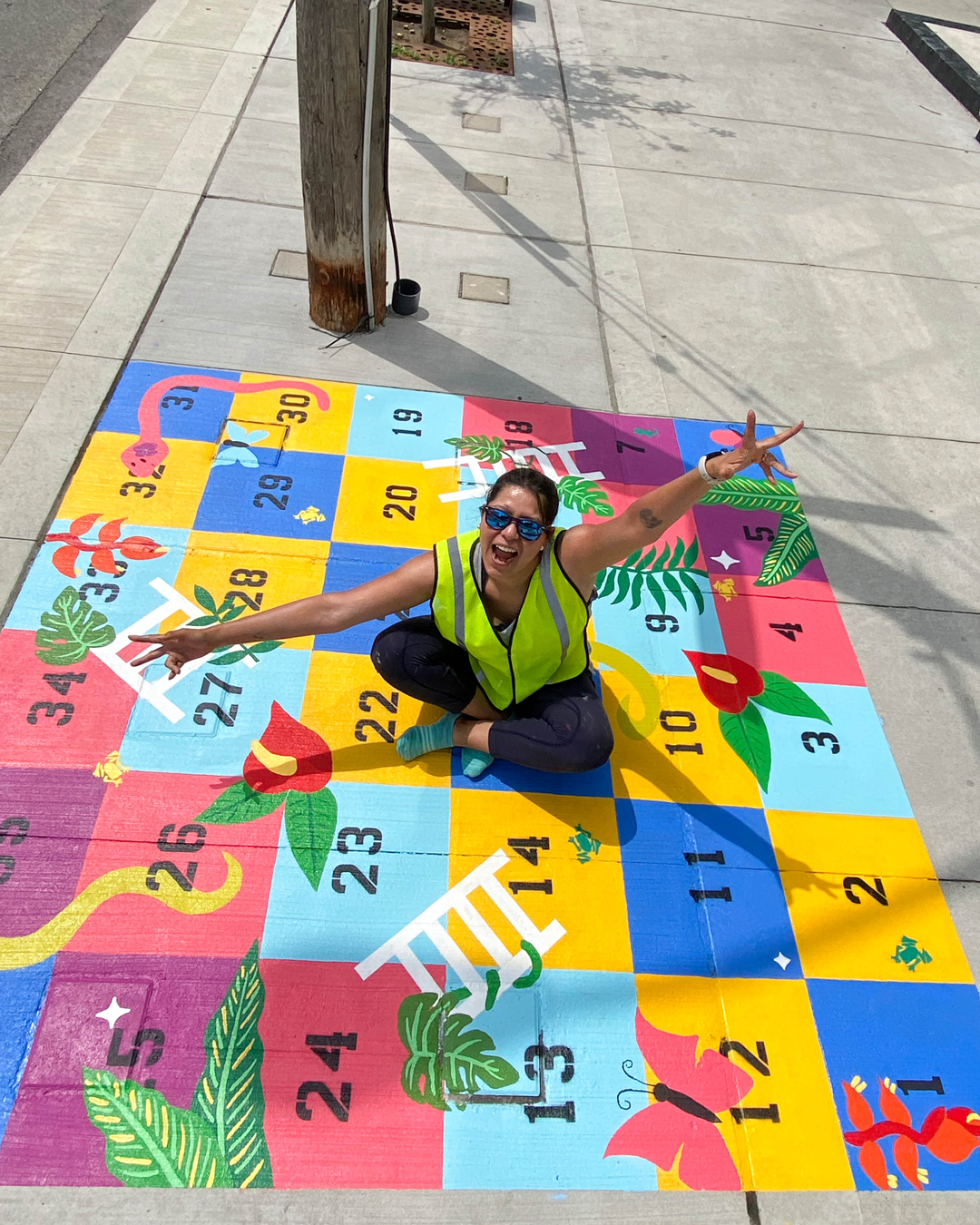 Colourful public mural in Toronto by Andreacataro featuring tropical plants and bold palettes