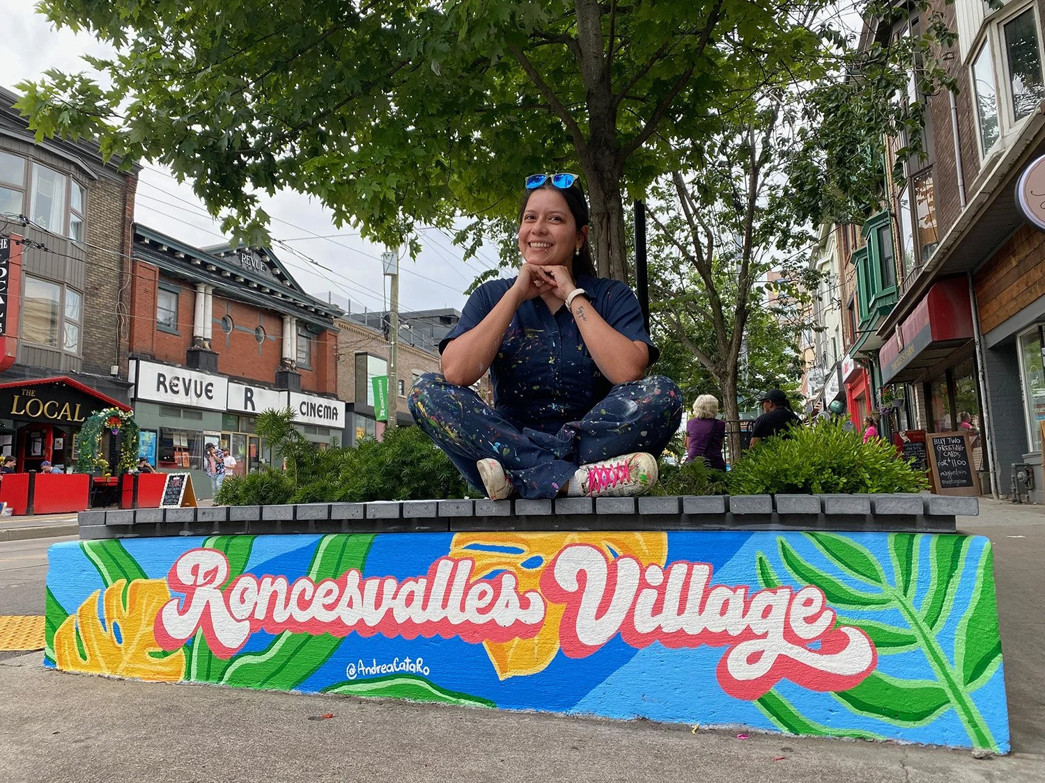 Toronto Roncesvalles Lettering mural and artist AndreaCataRo after completing the mural