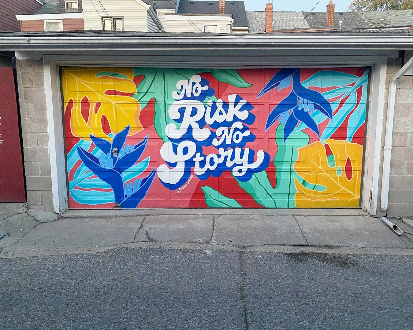 Finished outdoor mural by Toronto mural artist AndreaCataRo created with exterior materials for a public or business space.