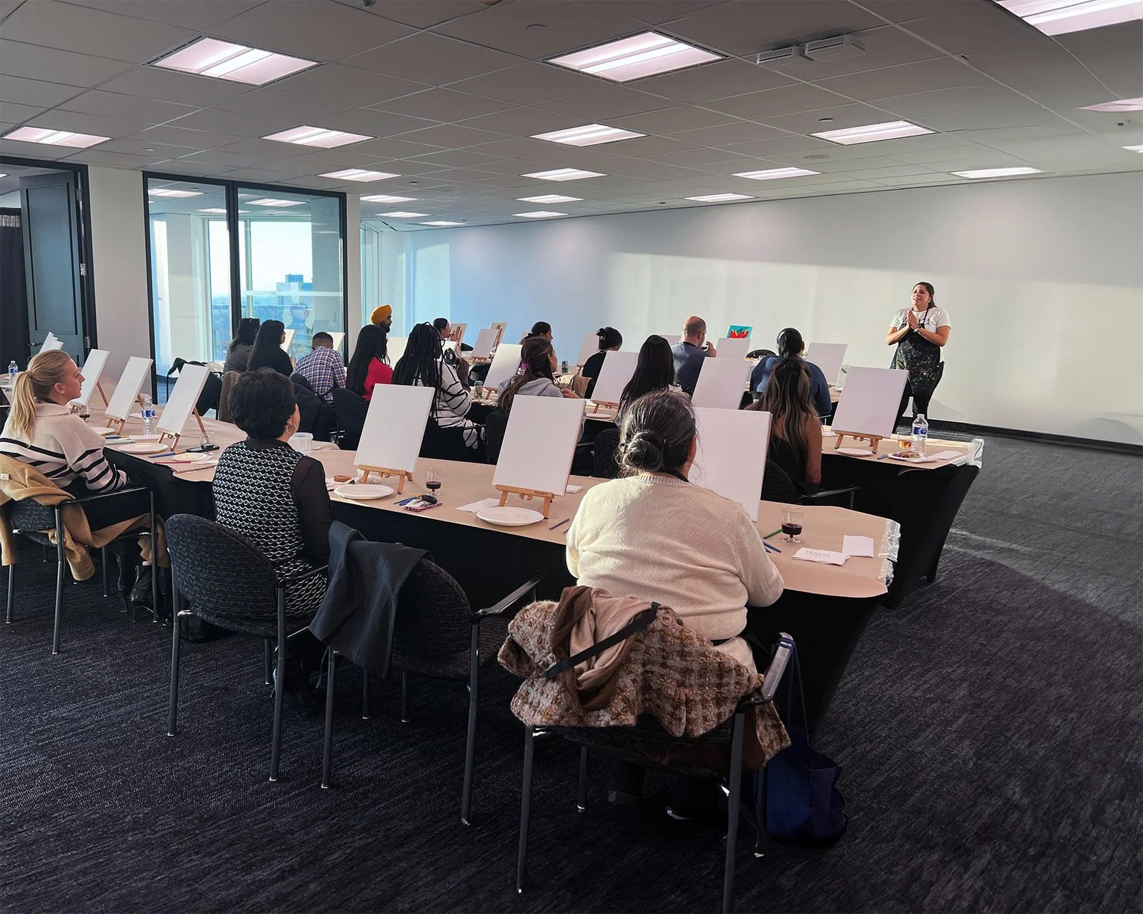 Andreacataro guiding a hands-on creative workshop focused on expression and community