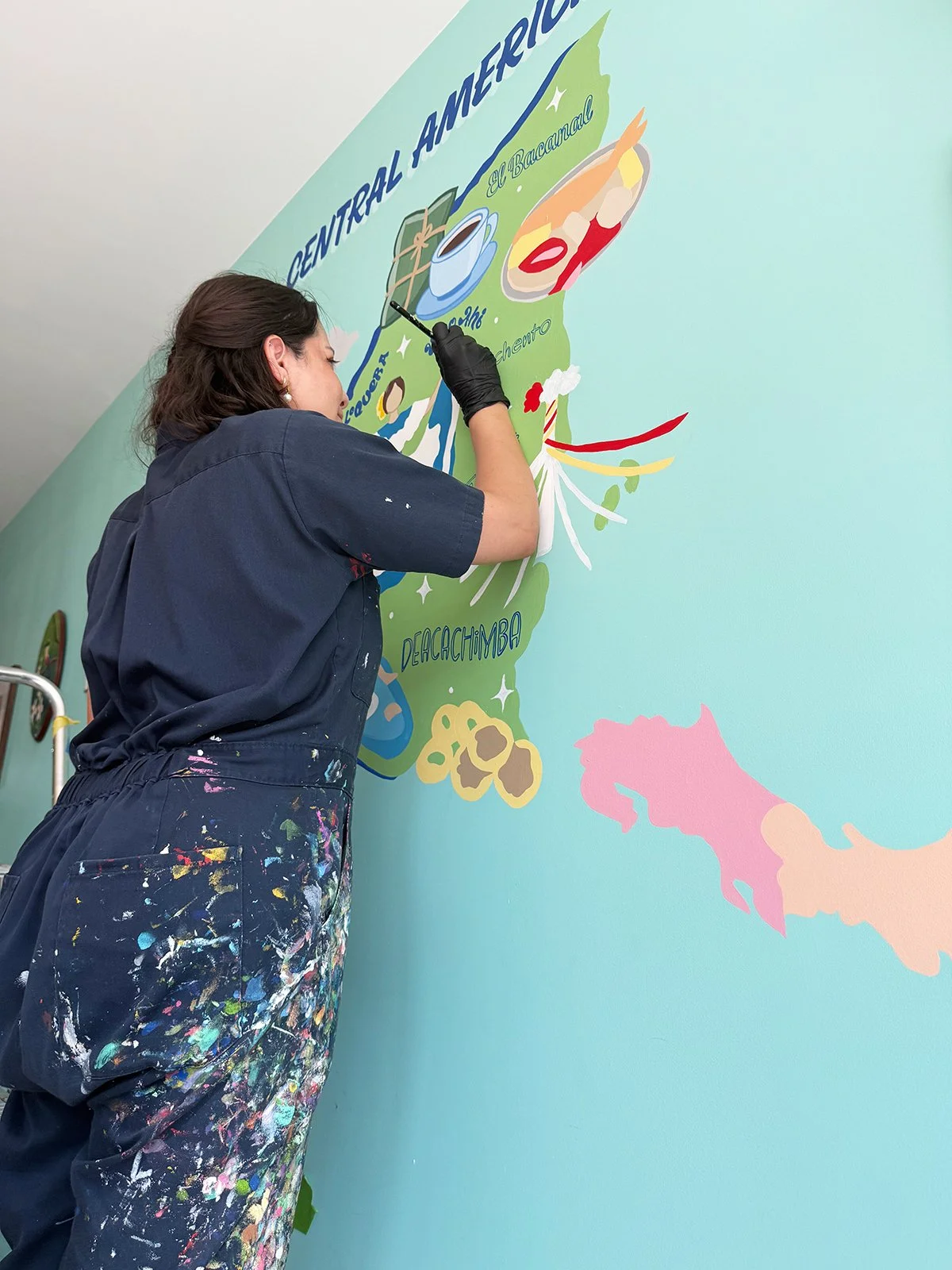 In-progress commissioned mural showing colour blocking and design development