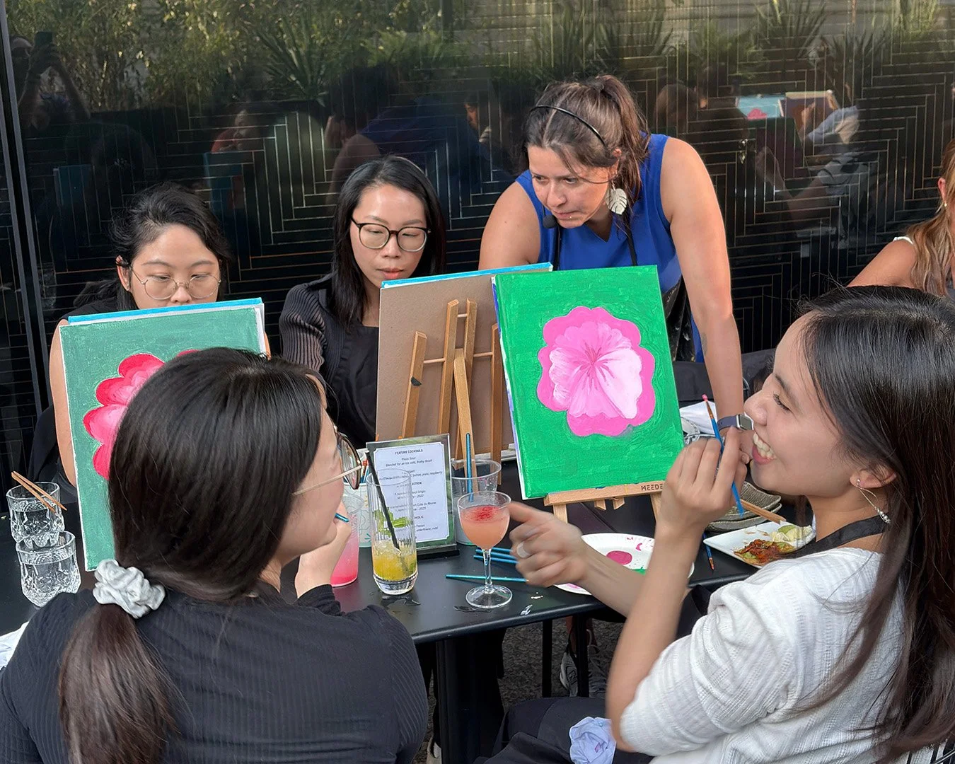 Andrea leading a workshop, engaging with participants