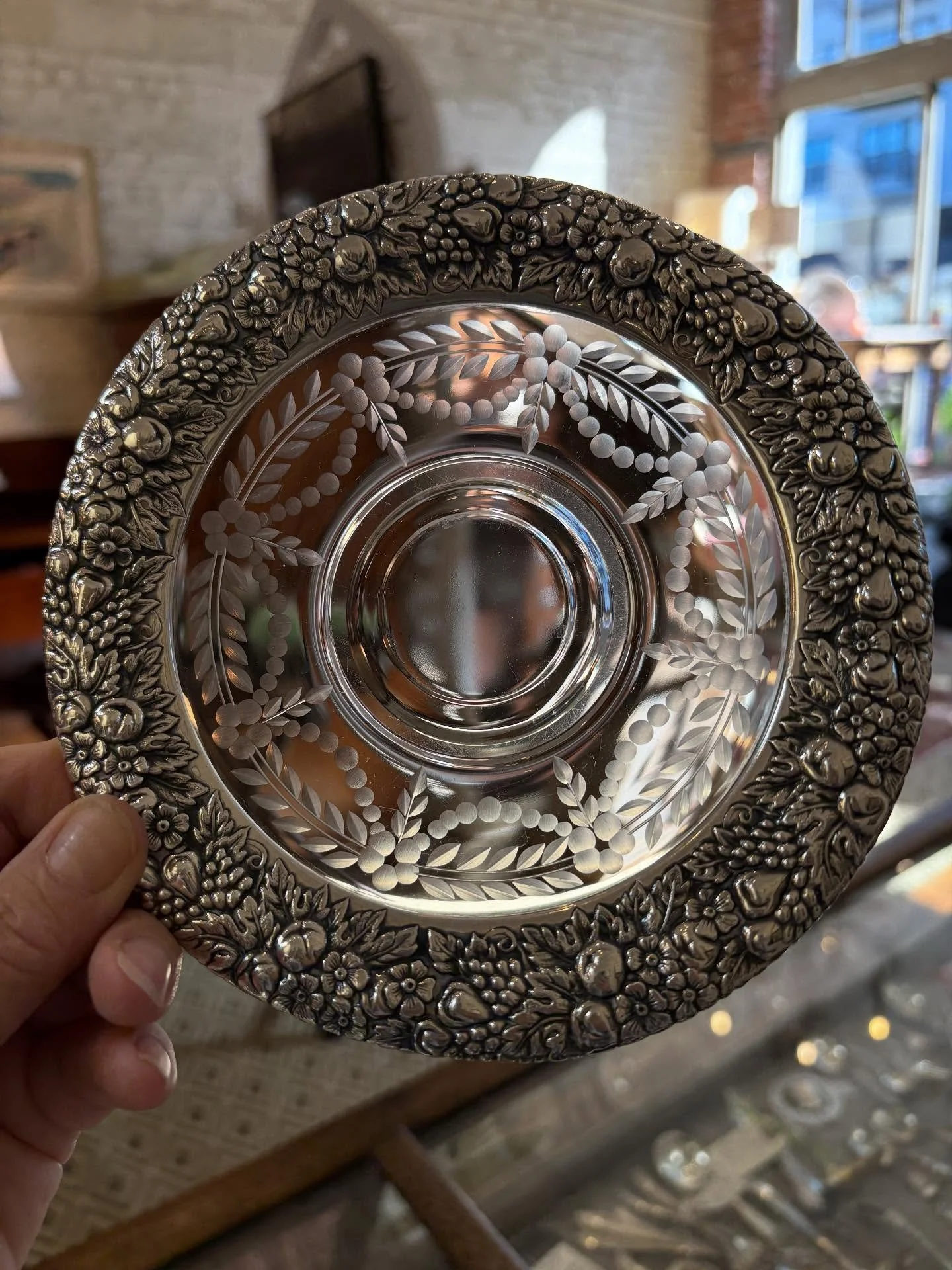 It’s Sunday; another sterling opportunity to showcase a pair of vintage etched plates rimmed in repousse  silver. Priced separately at $65.