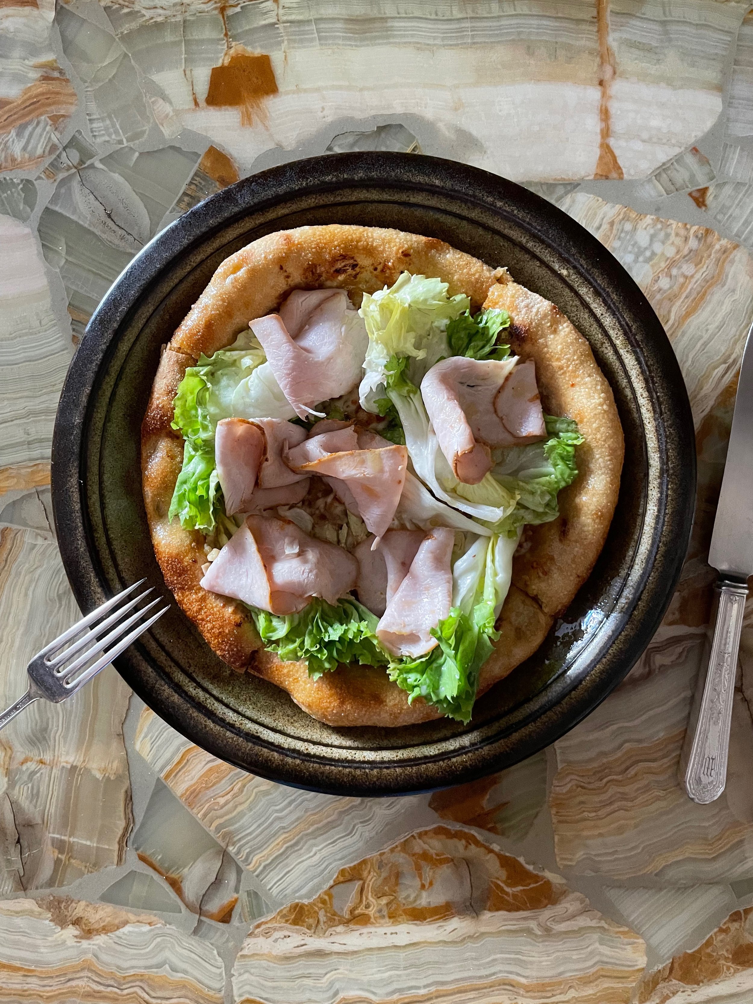 flatbread, escarole, caramelized onion, pork loin
