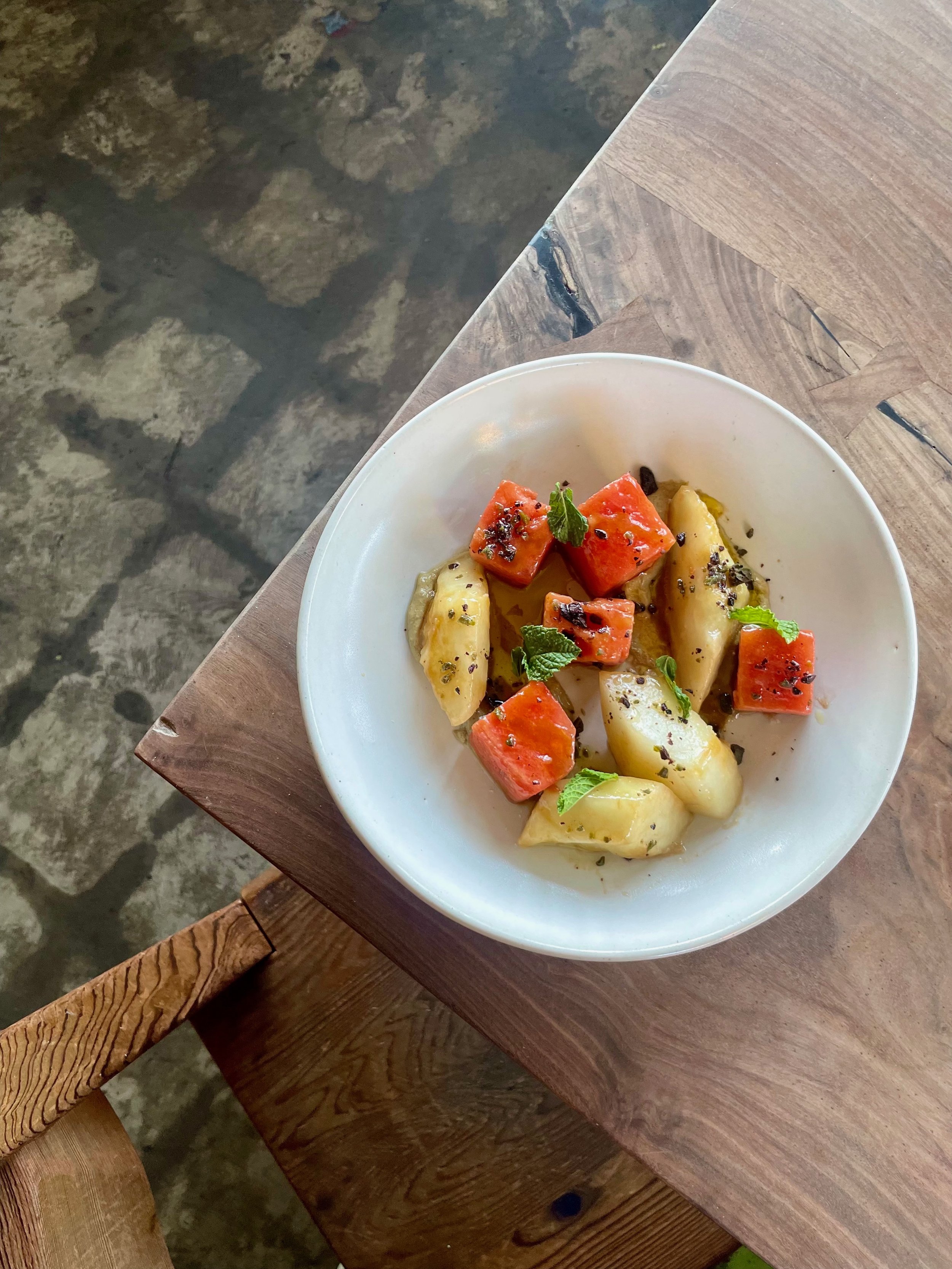 melon salad, pepita cream, olive