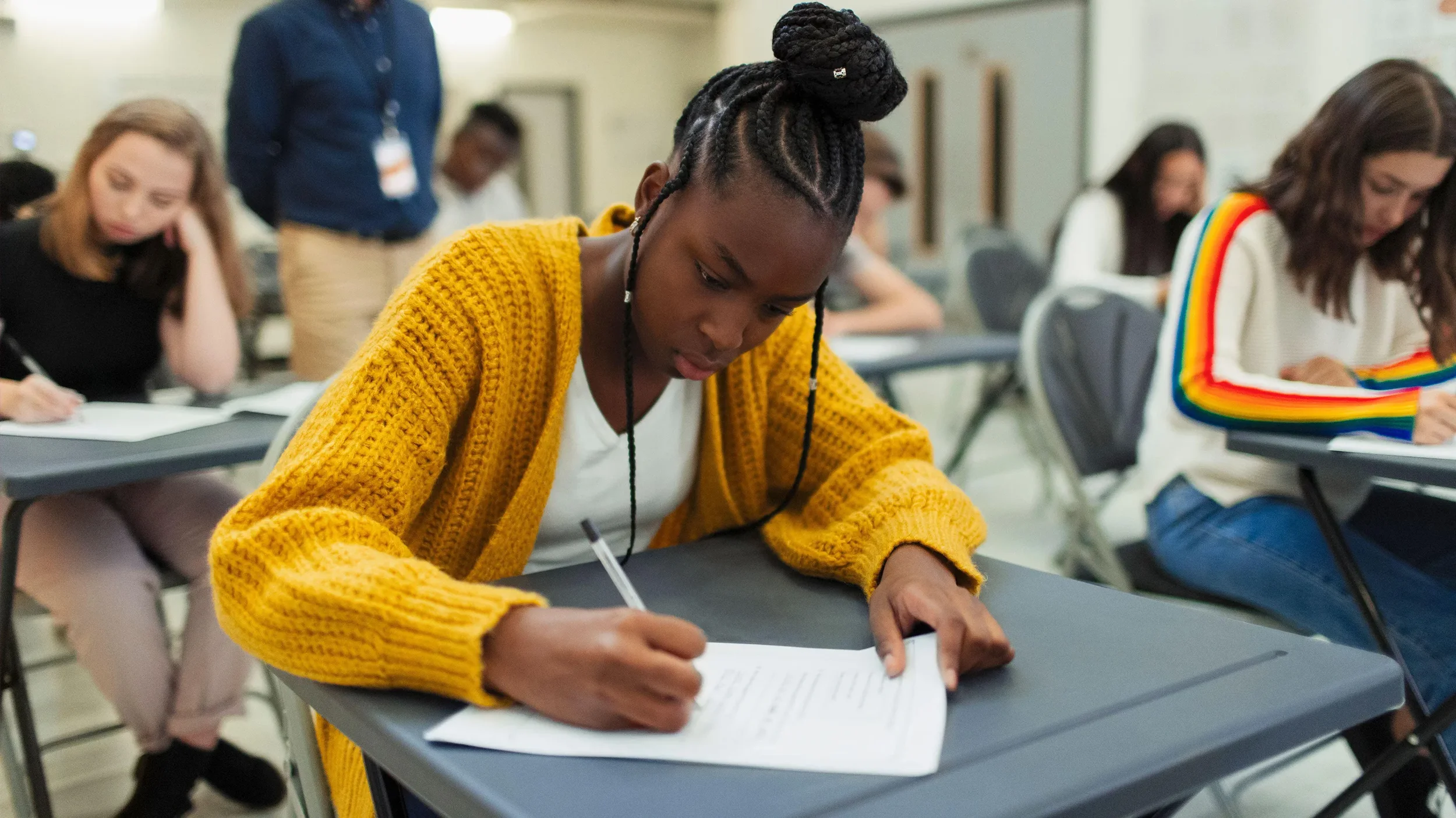 A student taking the paper version of the ACT in 2025