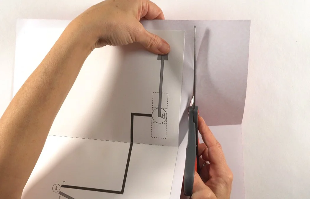 Cut a 1/2" boarder in your paper.