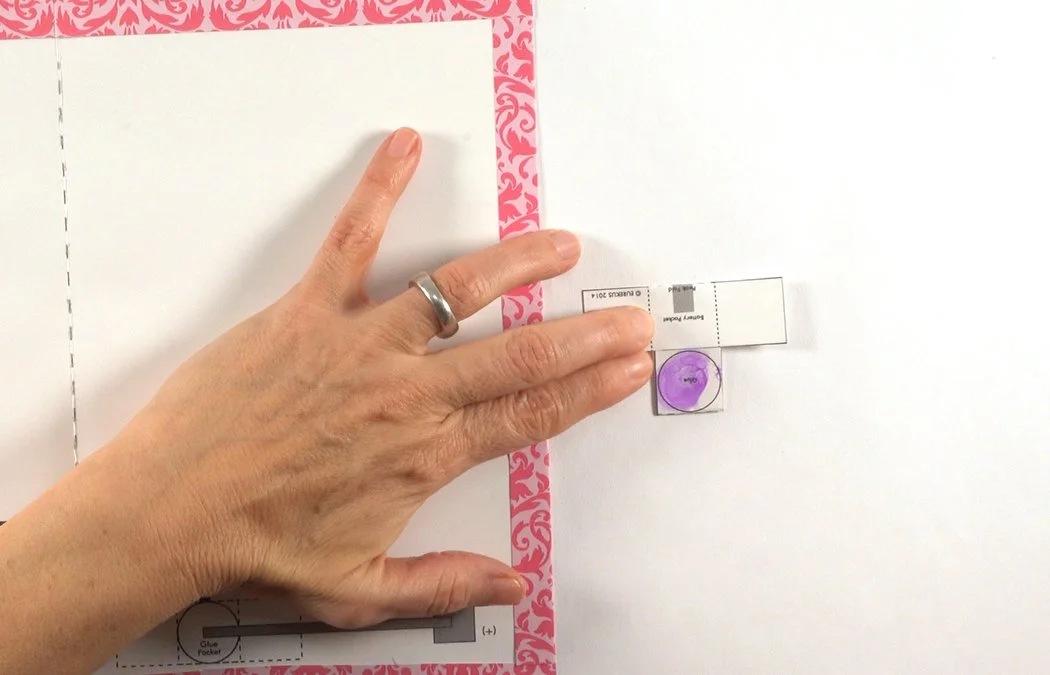 Get your battery box. Place glue in the circle.