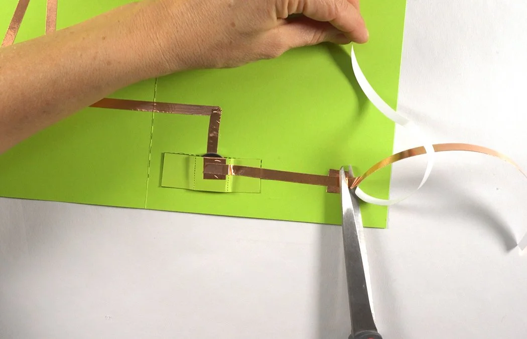 Trim your copper. Make sure it overlaps on the switch pad.