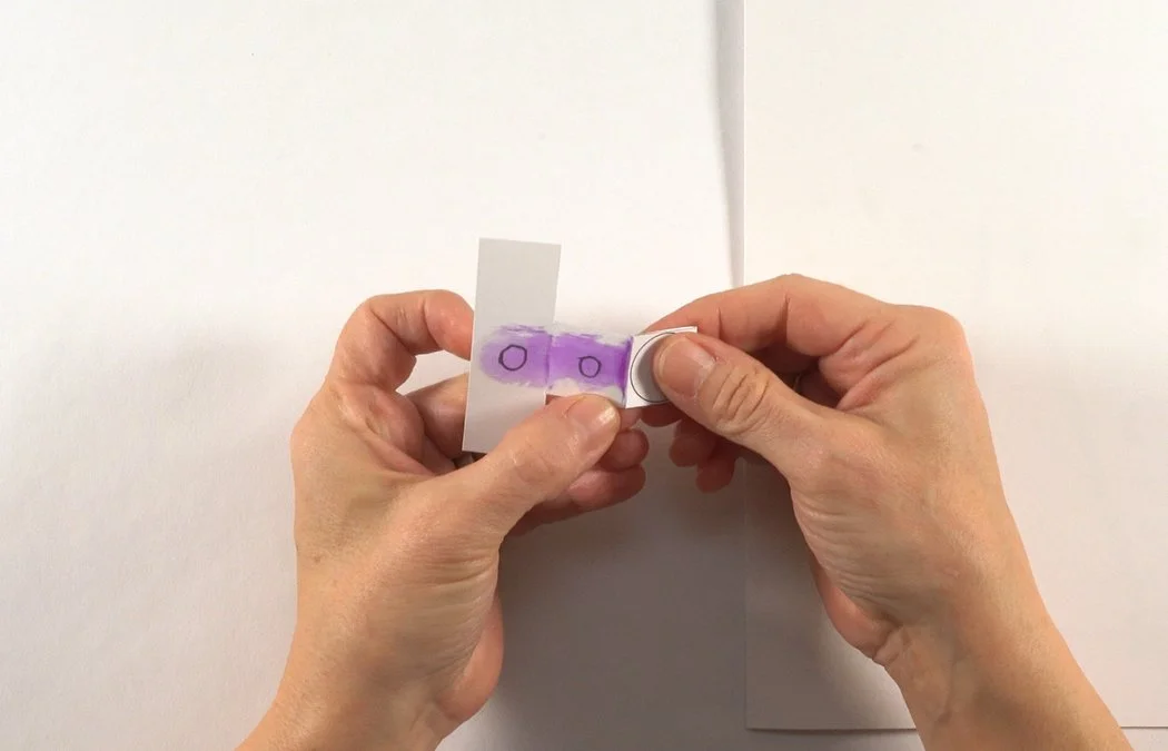 Fold the end panel over to glue X to X.
