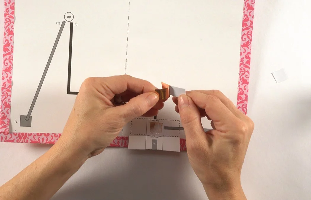 Cut a 1/2" x 1 1/4" copper rectangle.