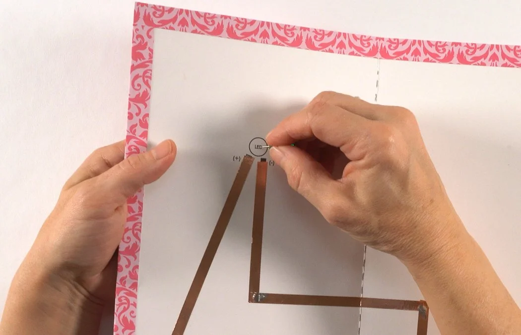 Poke a hole in the LED circle diagram with a thumb tack or needle.