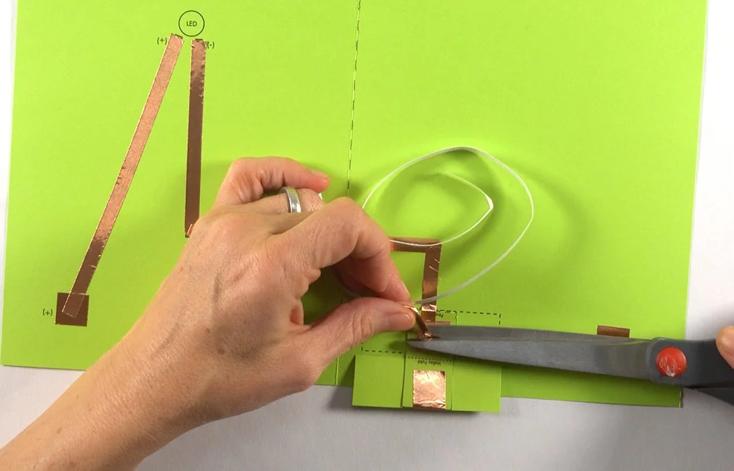 Continue to place your copper until it overlaps the copper square inside the battery box.