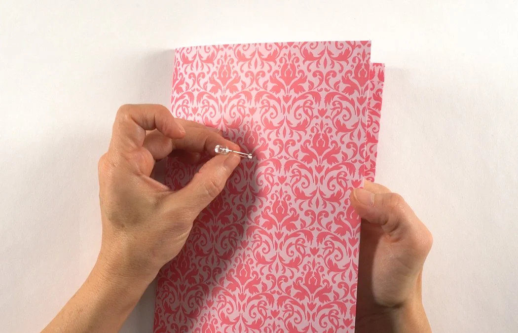 Insert the LED from the front of the card.