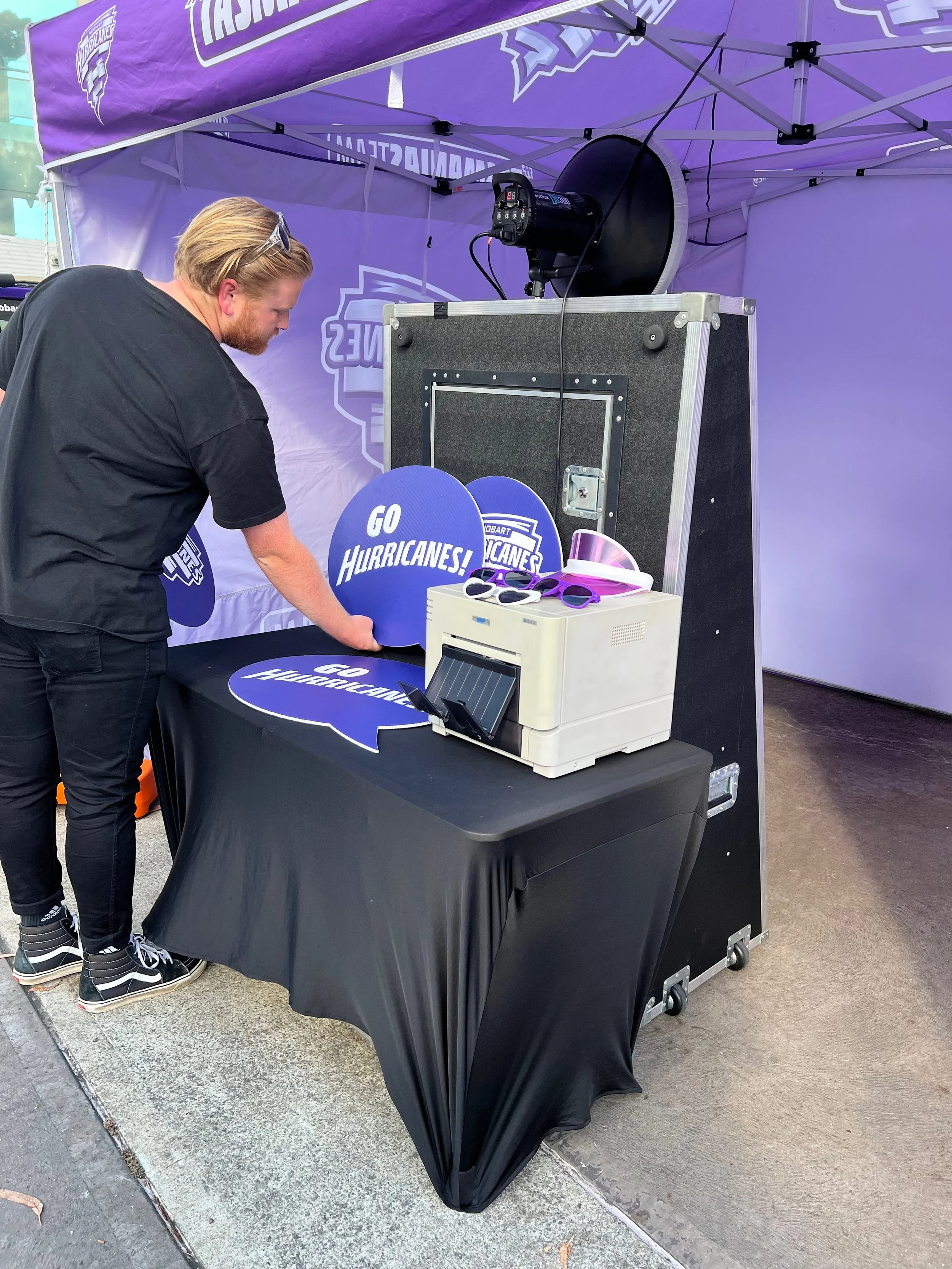 Professional DSLR camera and studio lighting setup in the Mirror Photo Booth, offering high-quality photo experiences for guests at events in Hobart, Tasmania