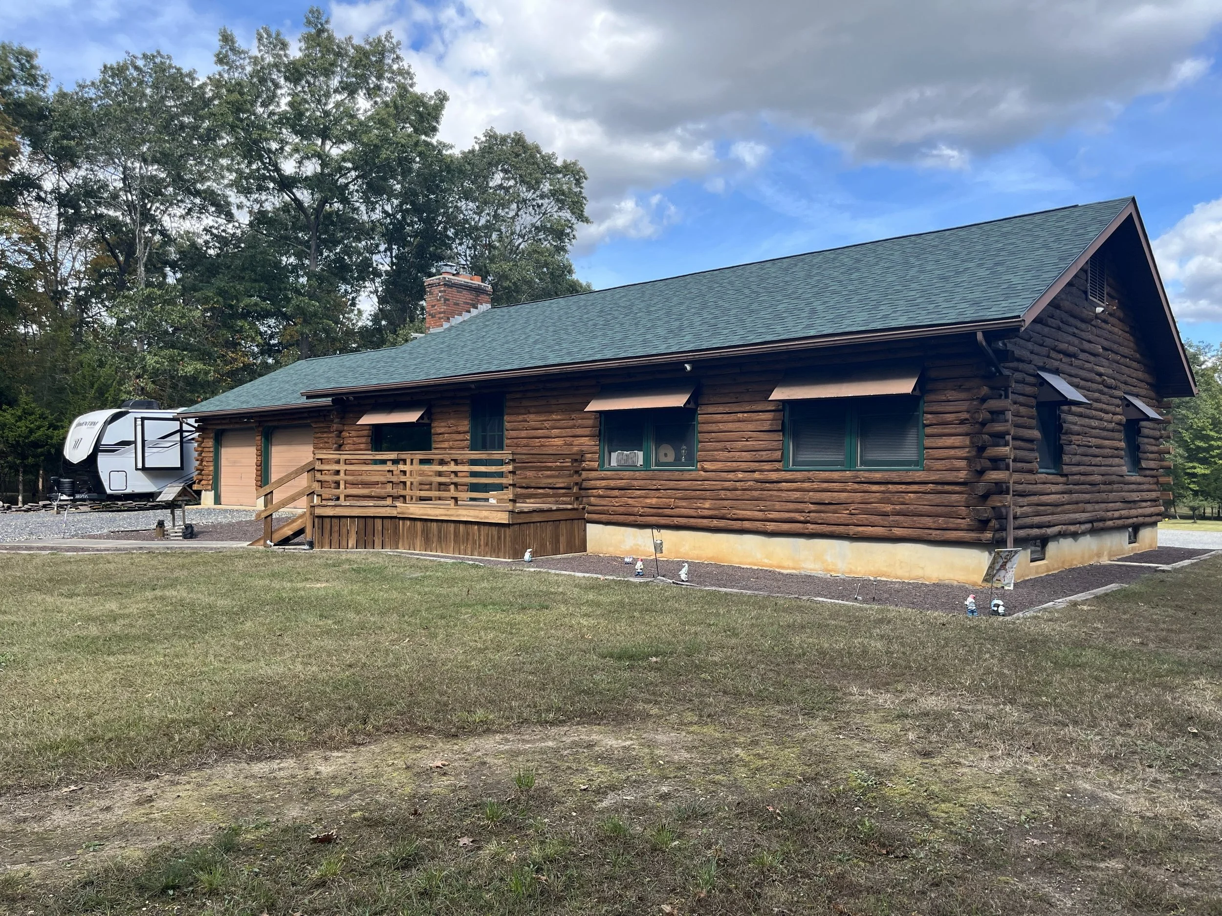 Log Cabin and Wood-sided Home Restoration by Deck Restoration Plus - Protect Your Investment