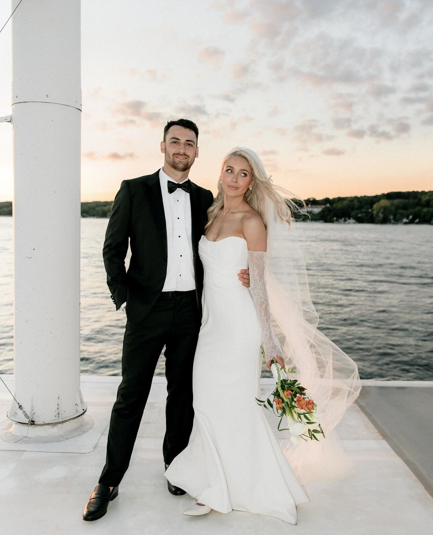 &quot;My chic, strapless corseted gown paired with long lace gloves was everything I dreamed of&mdash;modern, timeless, and entirely my own.&quot;⁠
⁠
Stunning real bride @tayraeamann found her dream gown, our WW23185. 🤍⁠
⁠
Photo: Kaleigh Rae Photogr