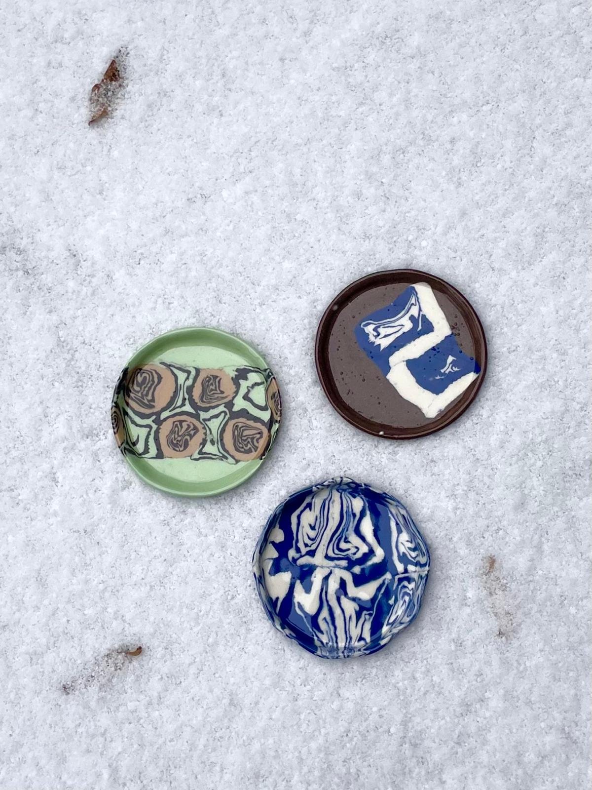 A group of decroative bowls featuring various textures and colours.