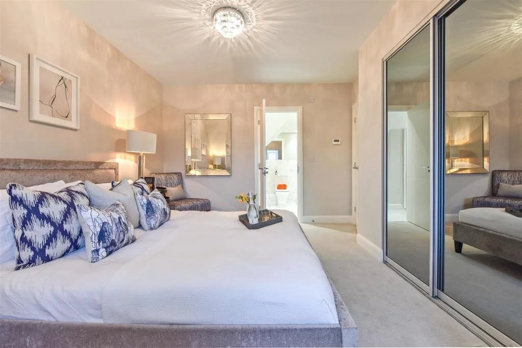 Stylish wide, 2 door wardrobe. Fitted in a master bedroom in Worthing.