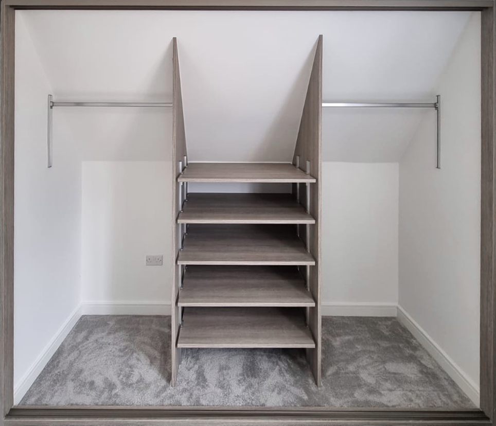 interiors for a sloped cieling fitted wardrobe.