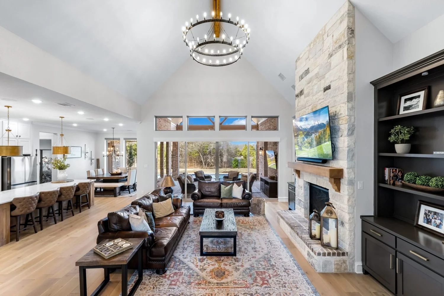 Custom home living room with stone fireplace