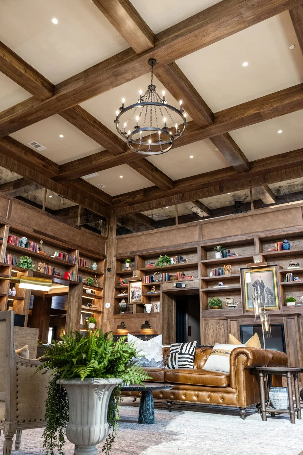 Living room with wooden beamed ceiling and chandelier