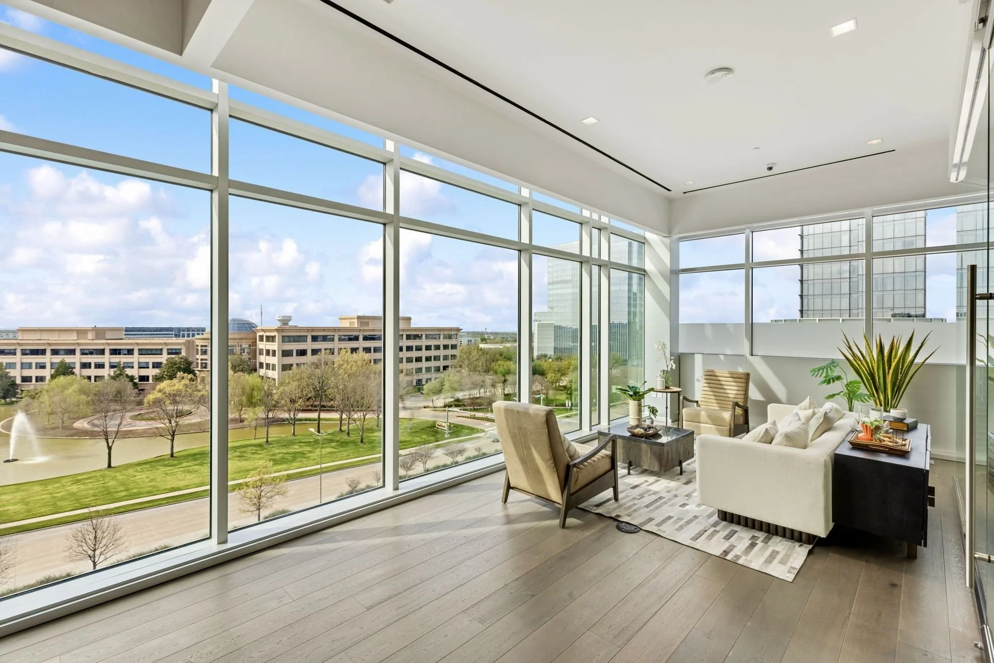 Corner executive lounge with floor-to-ceiling windows