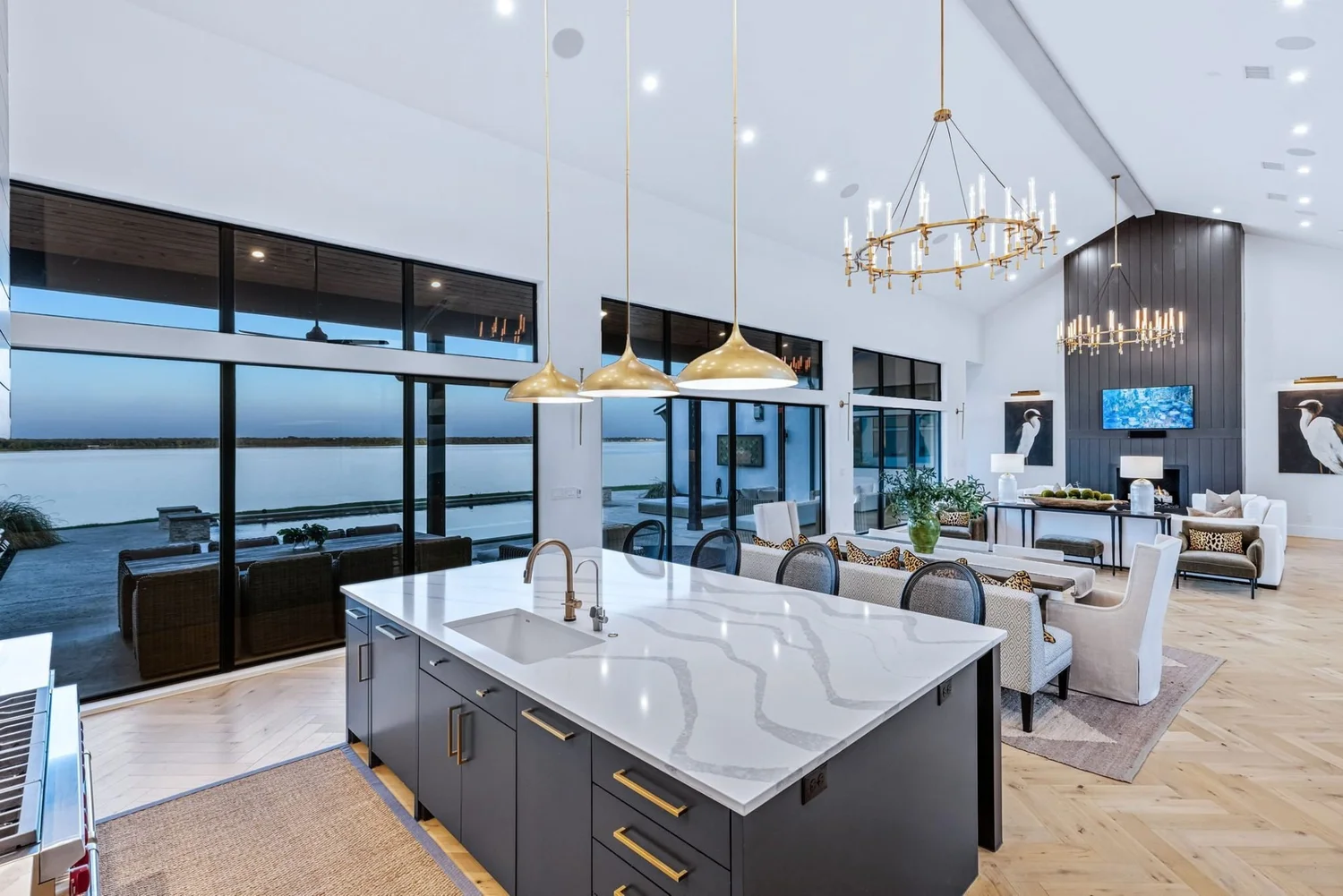 Lake house kitchen with marble island and lake views