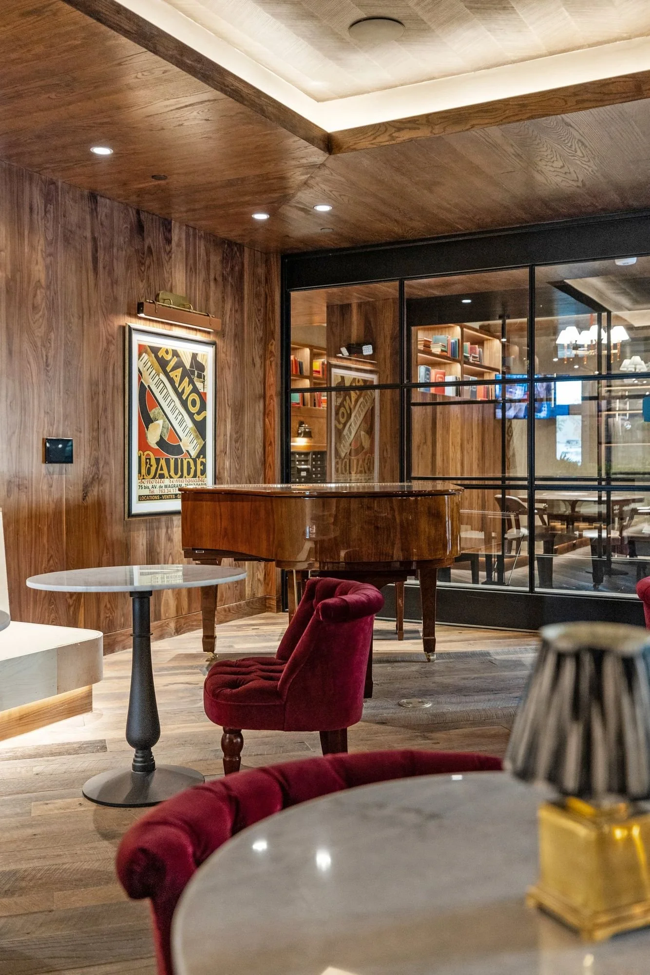 Piano lounge with walnut paneling