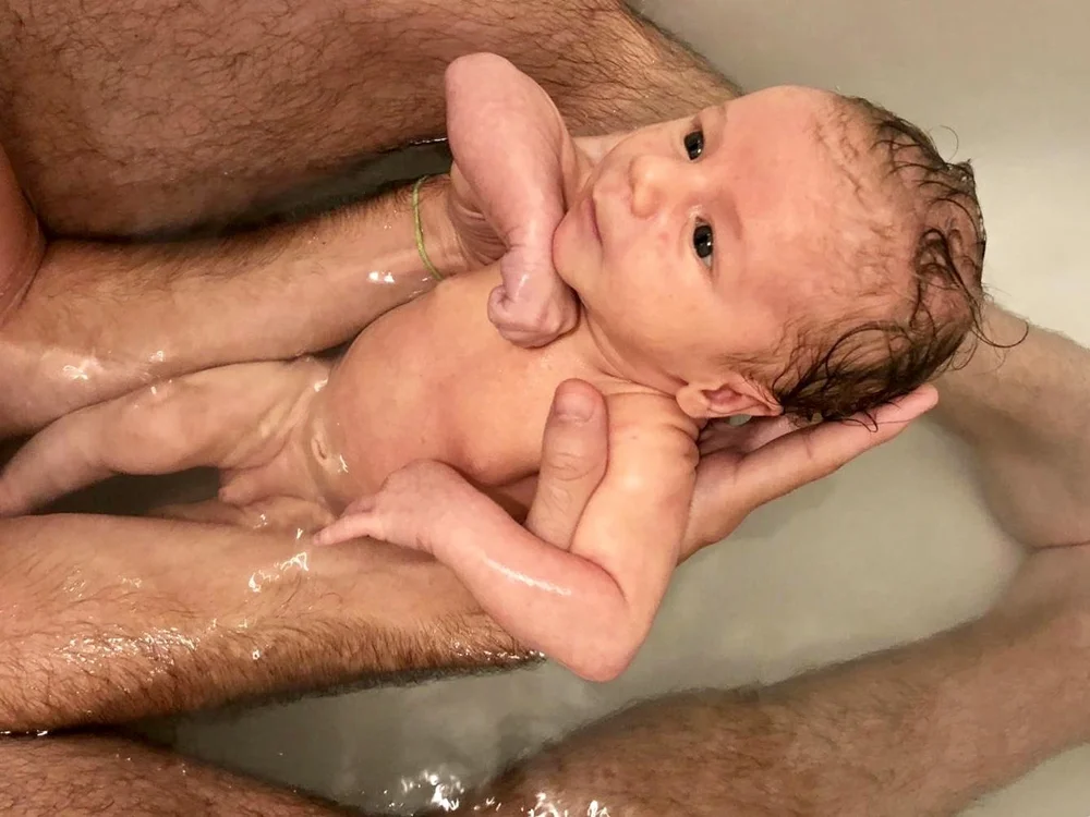 Having a warm bath together