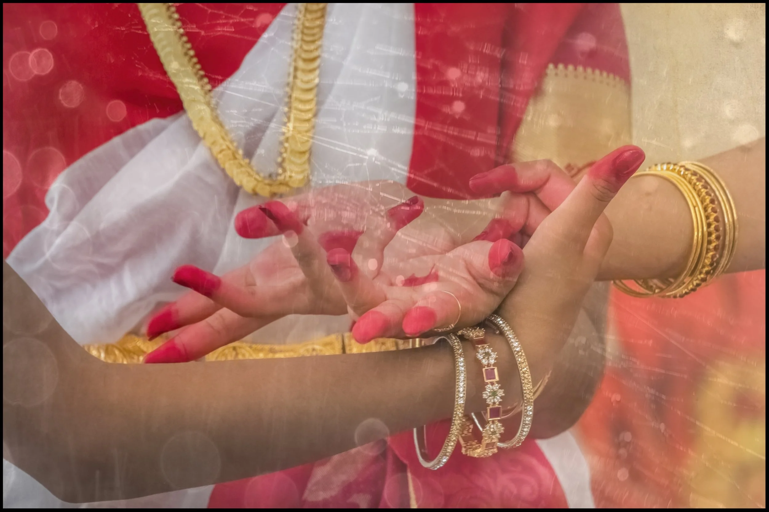 Hands lift softly, as though offering silence itself, a prayer carried on breath more than words.