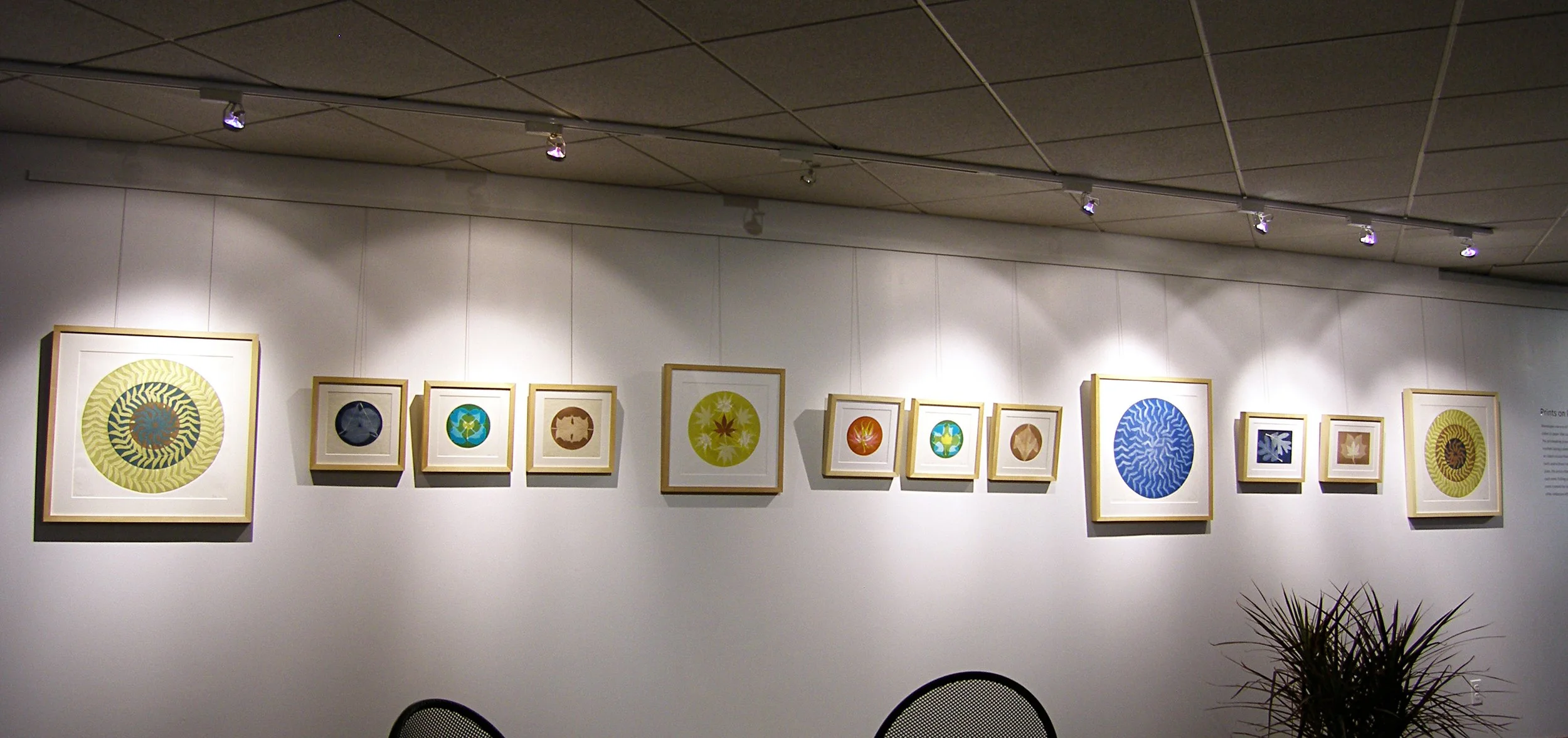 Wall of Prints on Paper on the other side of the Gallery