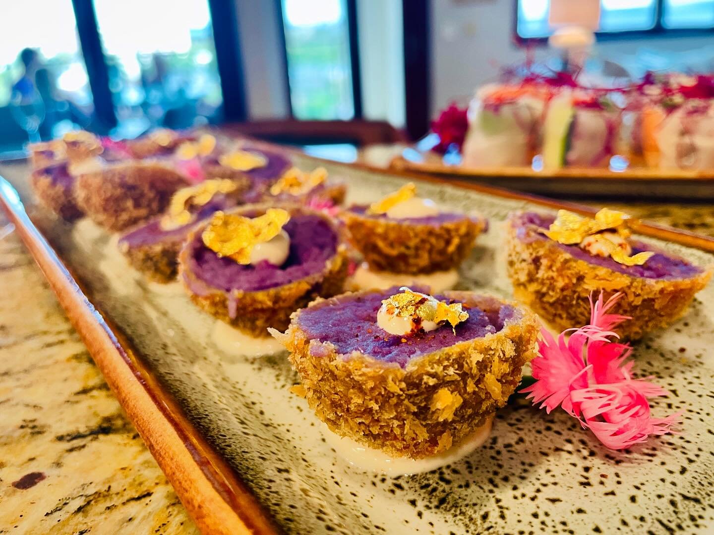 Indulge in a taste of the islands with our Molokai sweet potato croquettes, handcrafted to perfection. Using the vibrant, naturally purple sweet potatoes from Molokai, these crispy, golden bites offer a unique blend of local flavors and textures. Per