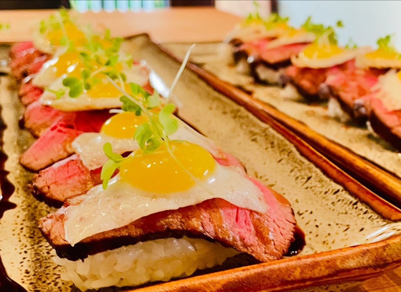 Indulge in the ultimate fusion of flavors with my Sous Vide Filet Mignon Nigiri, topped with delicate quail eggs. A perfect blend of tender beef and rich yolk, this dish is a luxurious bite that showcases the finest ingredients and technique. 🌺🍣

#