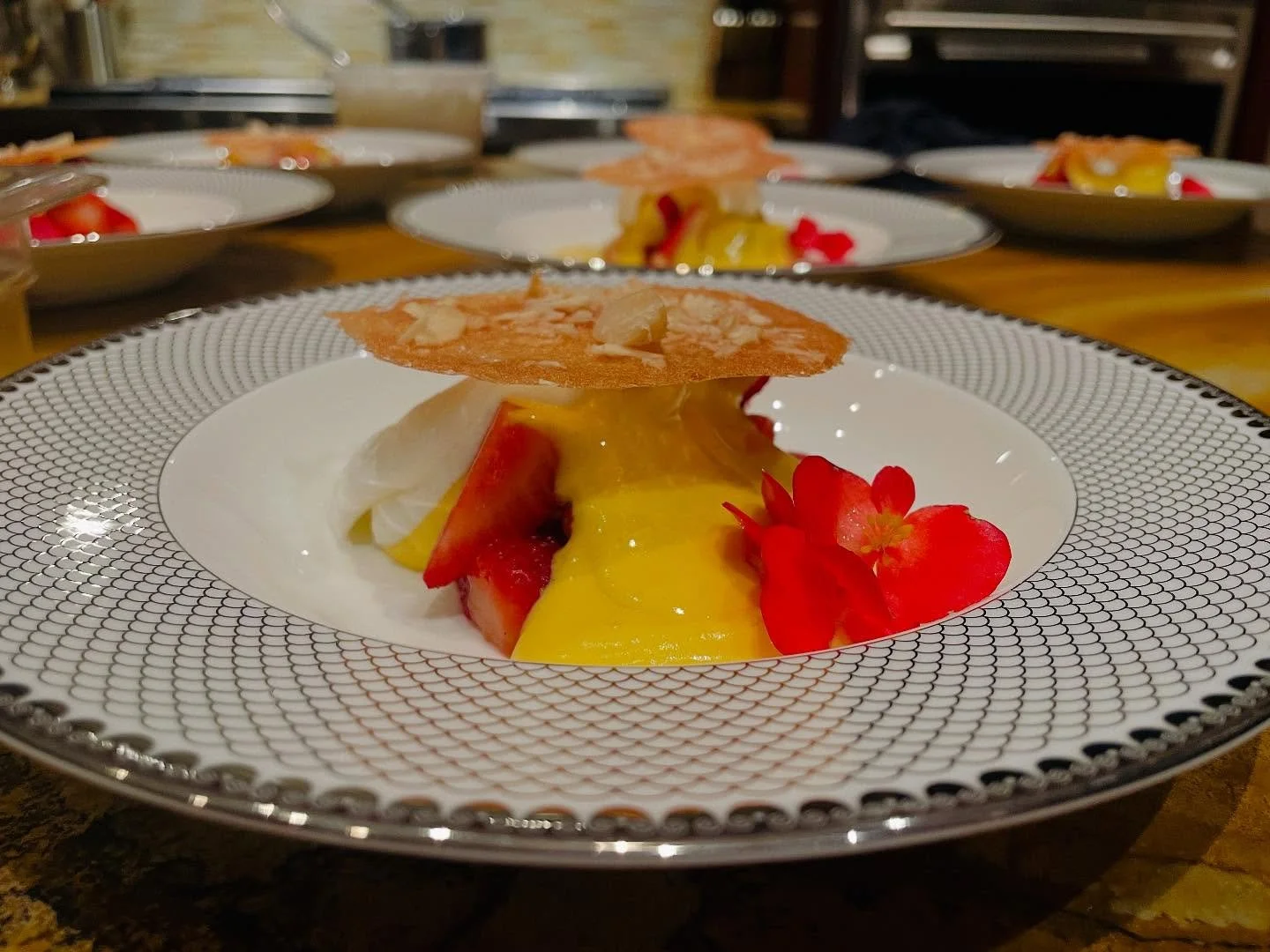 Elevate your Maui dining experience with our exquisite Lilikoi Passion Fruit & Champagne Sabayon—a vibrant fusion of tropical lilikoi custard, hand-whipped cream, and fresh island fruit, crowned with a delicate macadamia nut tuile. This ele