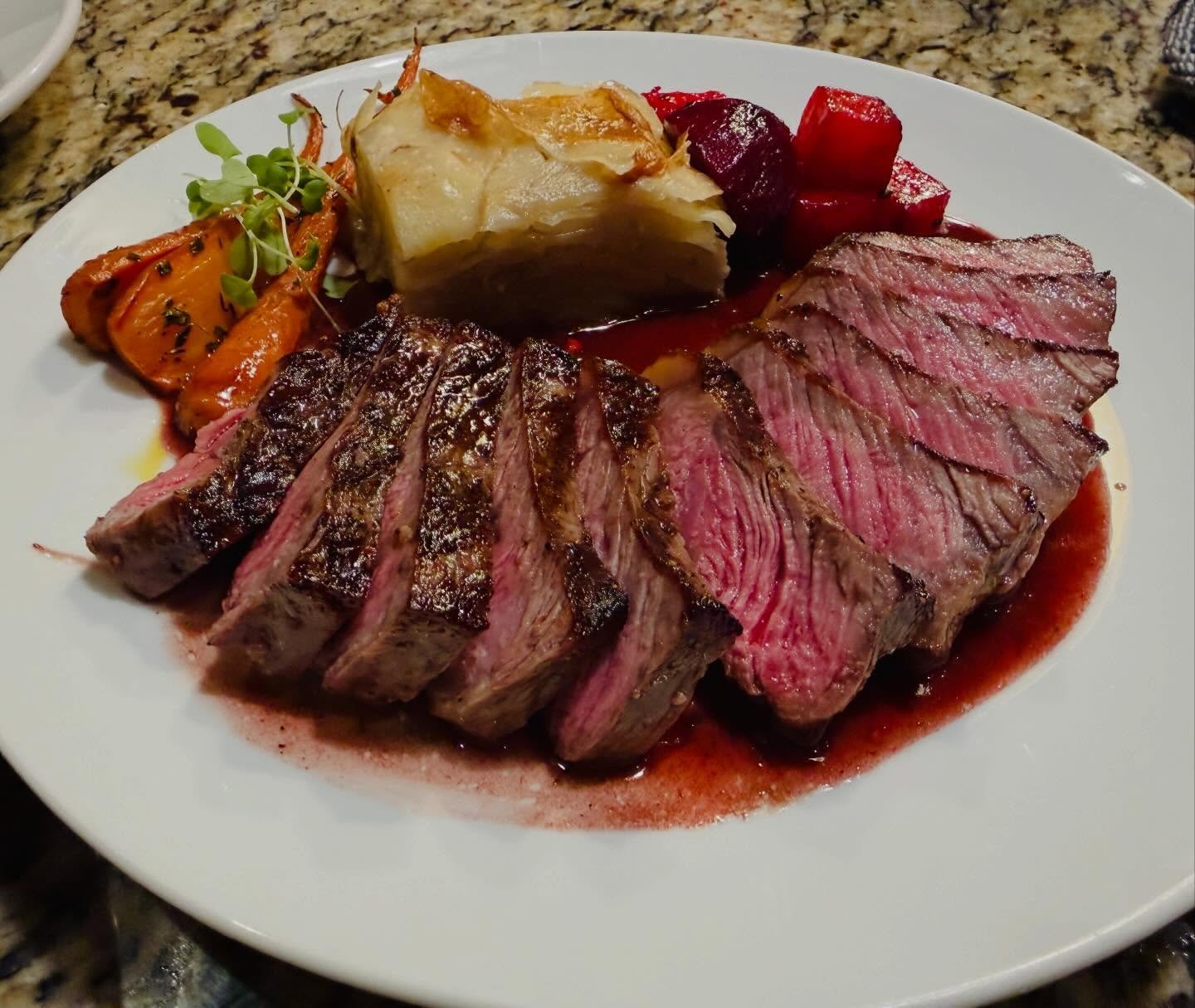 New York strip, perfectly seared and sliced to reveal a rich medium-rare center. Served with crispy potato gratin, herb-glazed carrots, roasted beets, and a silky red wine jus. Classic, elevated, and unapologetically indulgent.
#mauichef #farmtotable