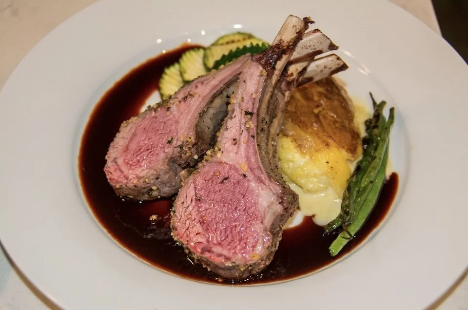 Herb crusted lamb rack with Kula vegetables.