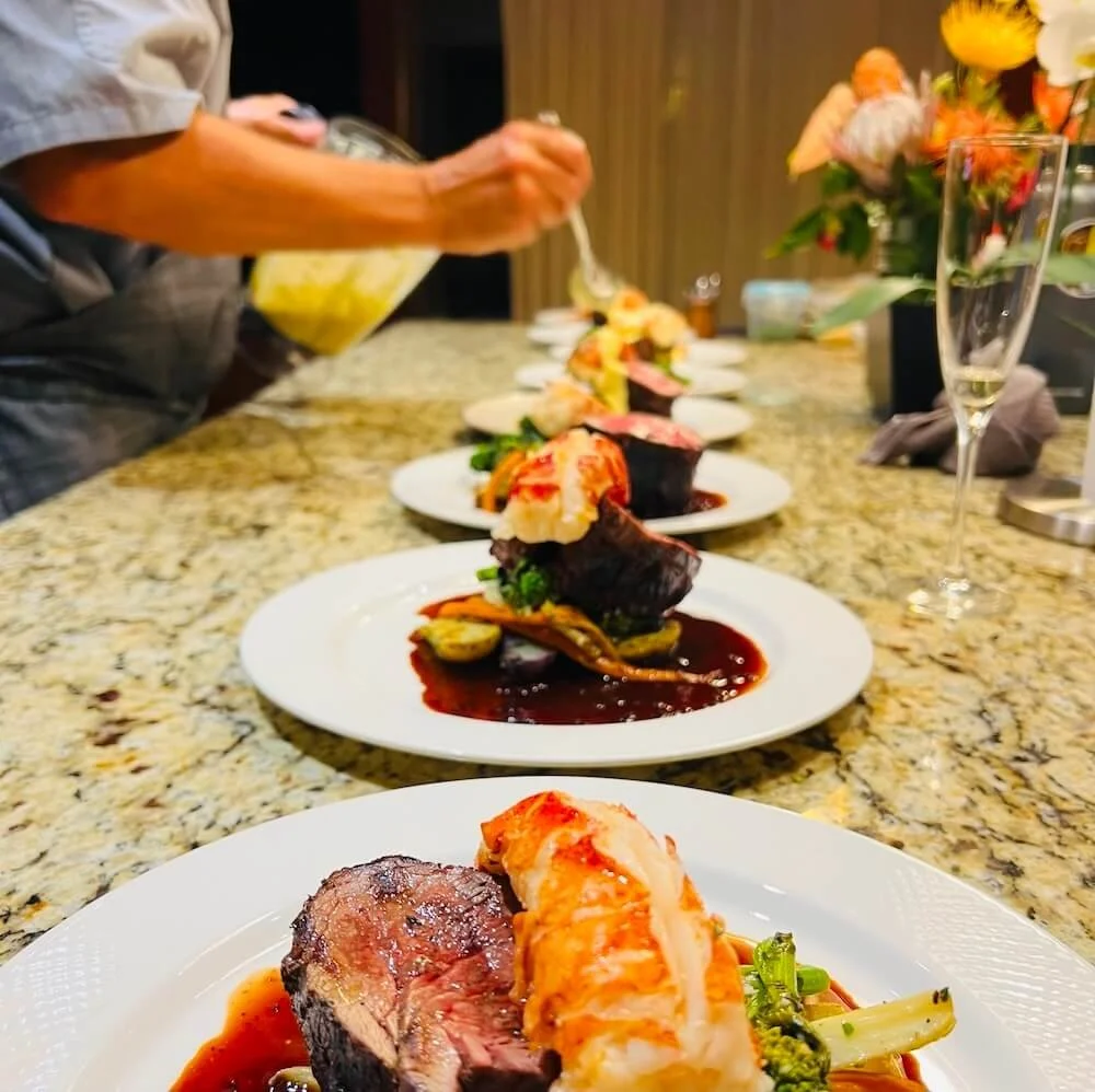 Maui private chef surf and turf in home dining with steak and seafood.
