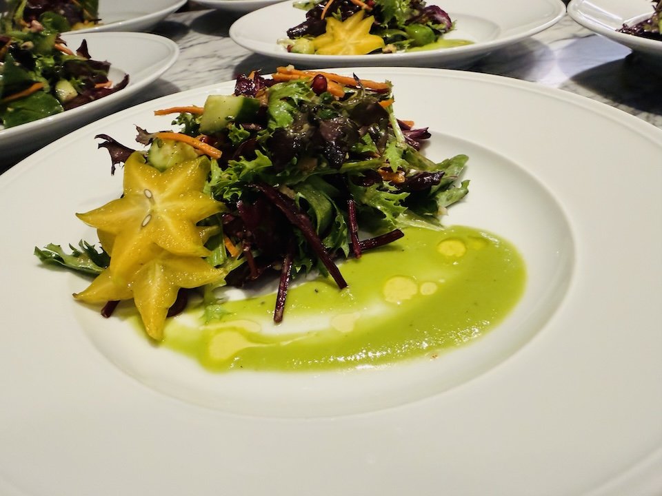 Upcountry Maui green salad with Haiku starfruit and Maui onion parsley vinaigrette.