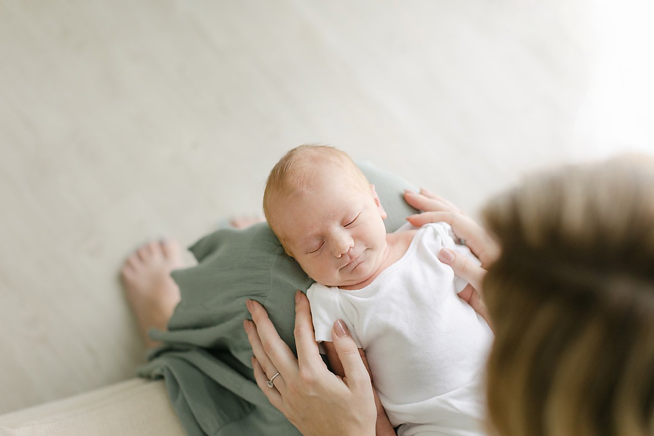 close up of sweet newborn during studio photoshoot