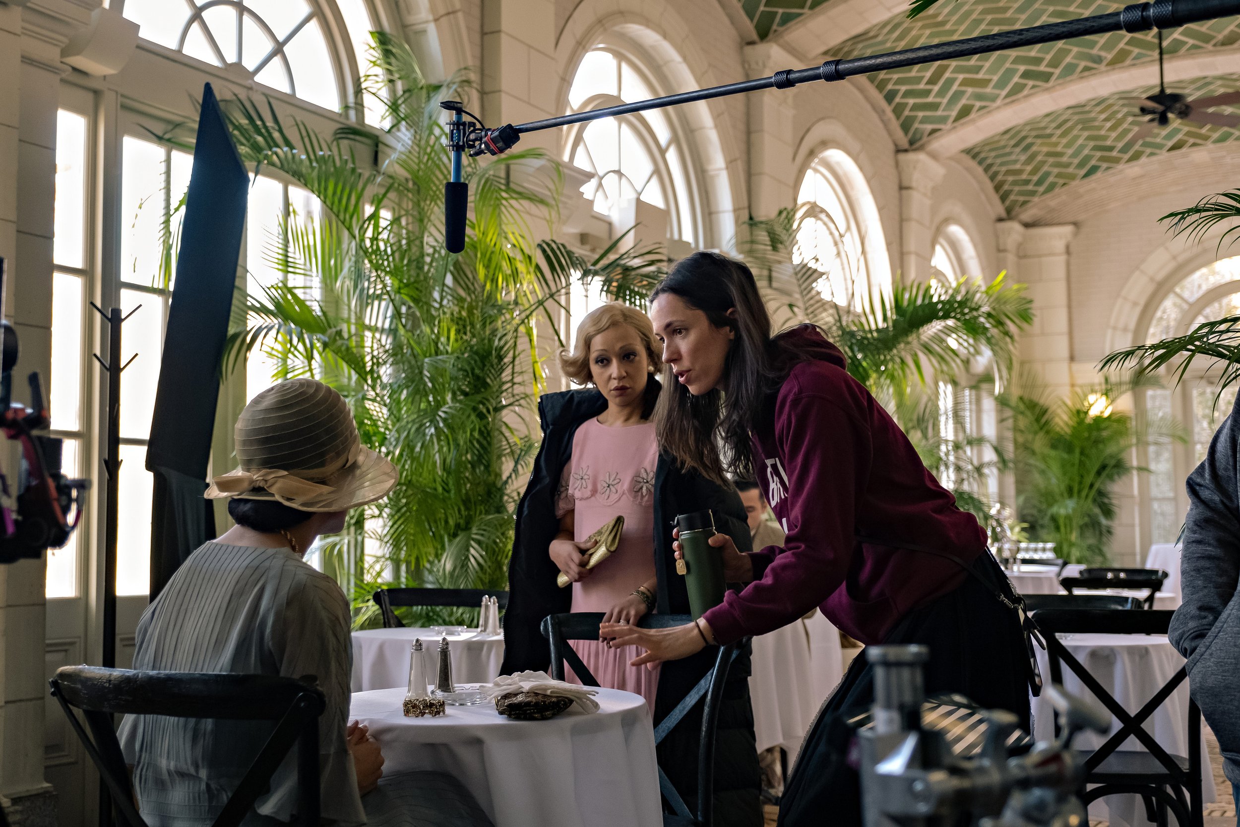  PASSING (L to R) TESSA THOMPSON as IRENE, RUTH NEGGA as CLARE	and DIRECTOR REBECCA HALL. Cr: Emily V. Aragones/Netflix © 2021 