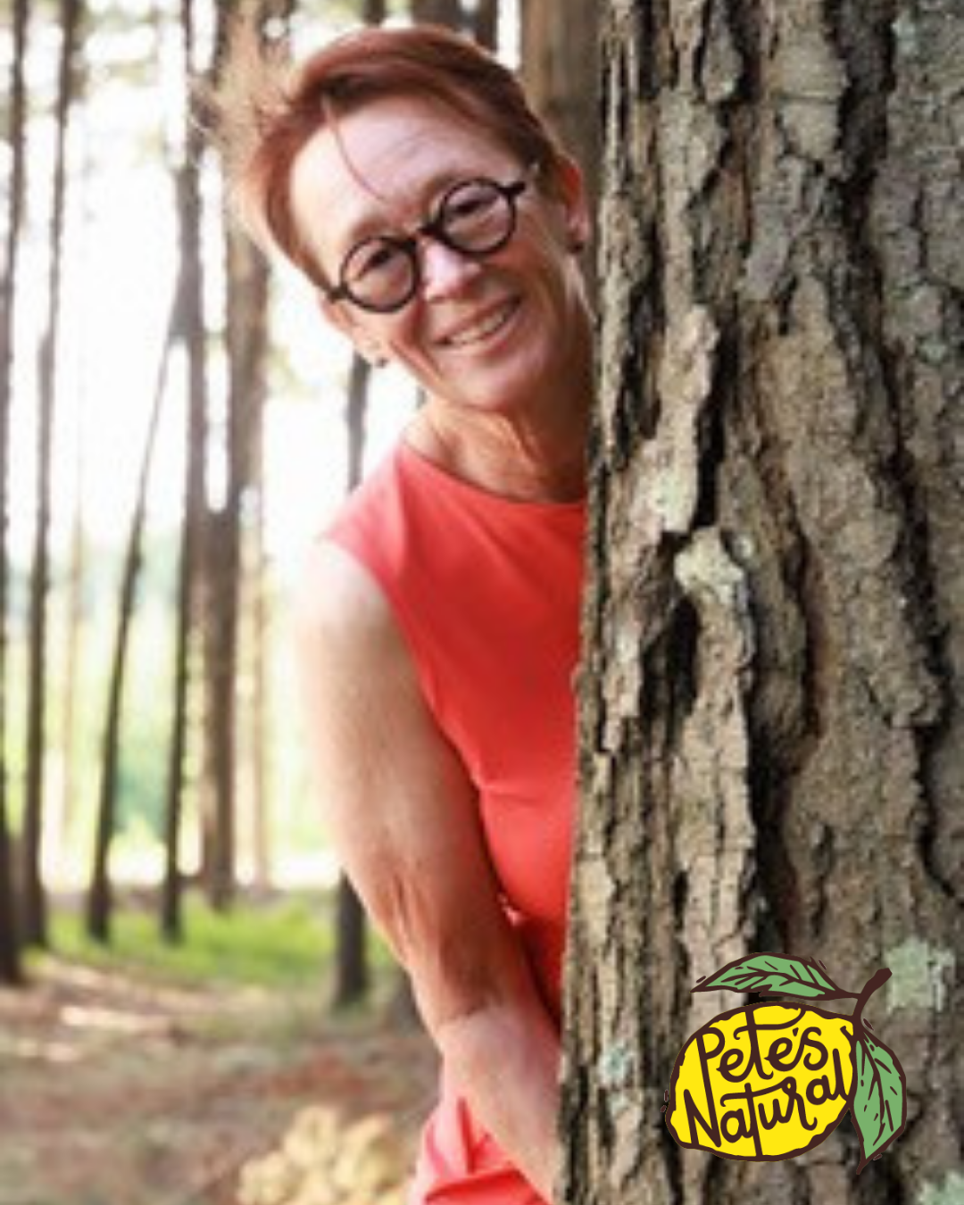 Mrs Pete behind a tree