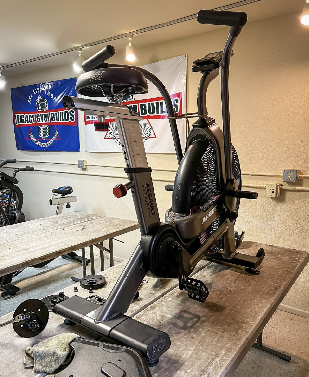 Gym maintenance on an AssaultBike Elite stationary bike