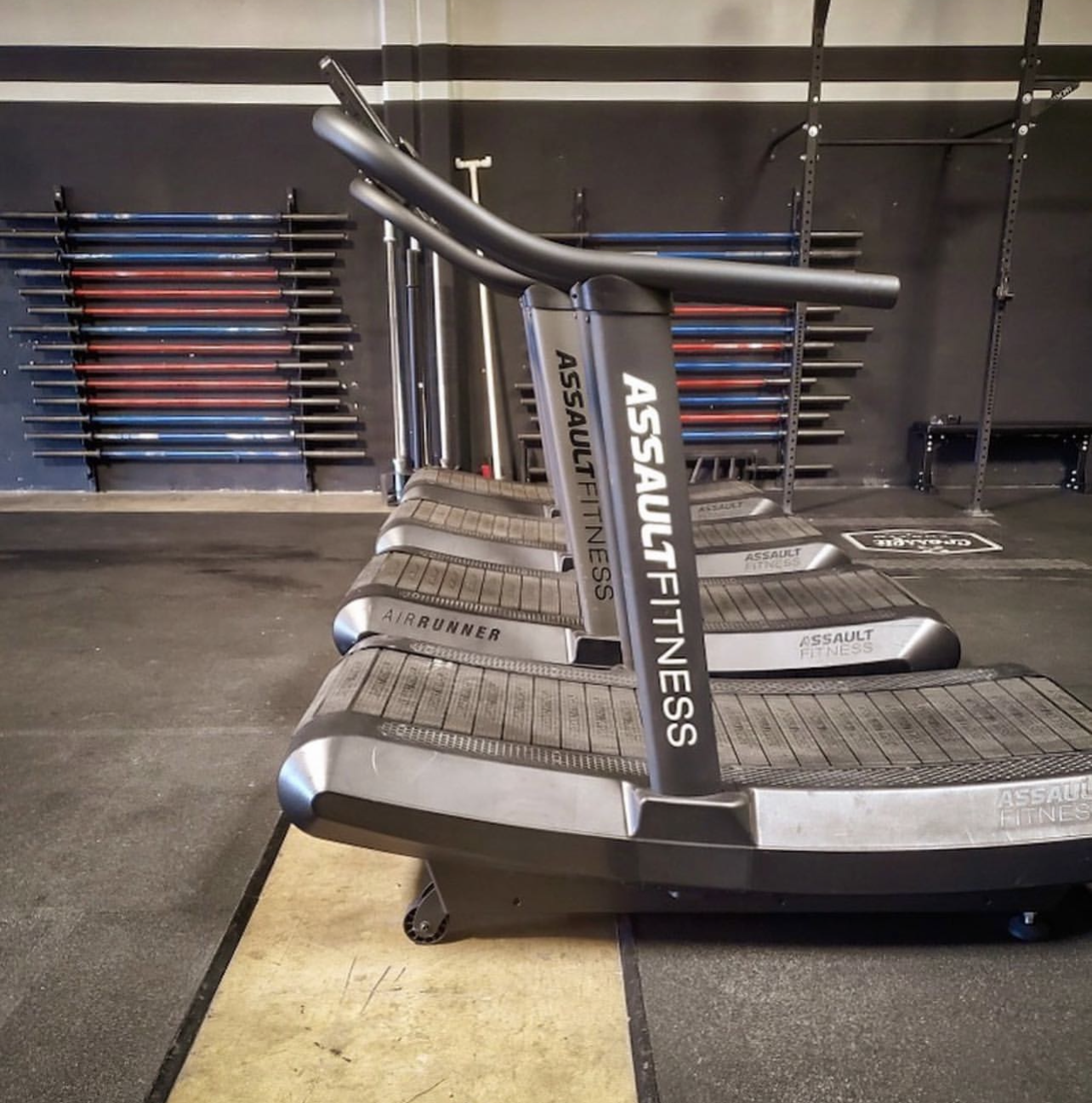 Gym maintenance on an AssaultRunner treadmill at a gym in Los Angeles