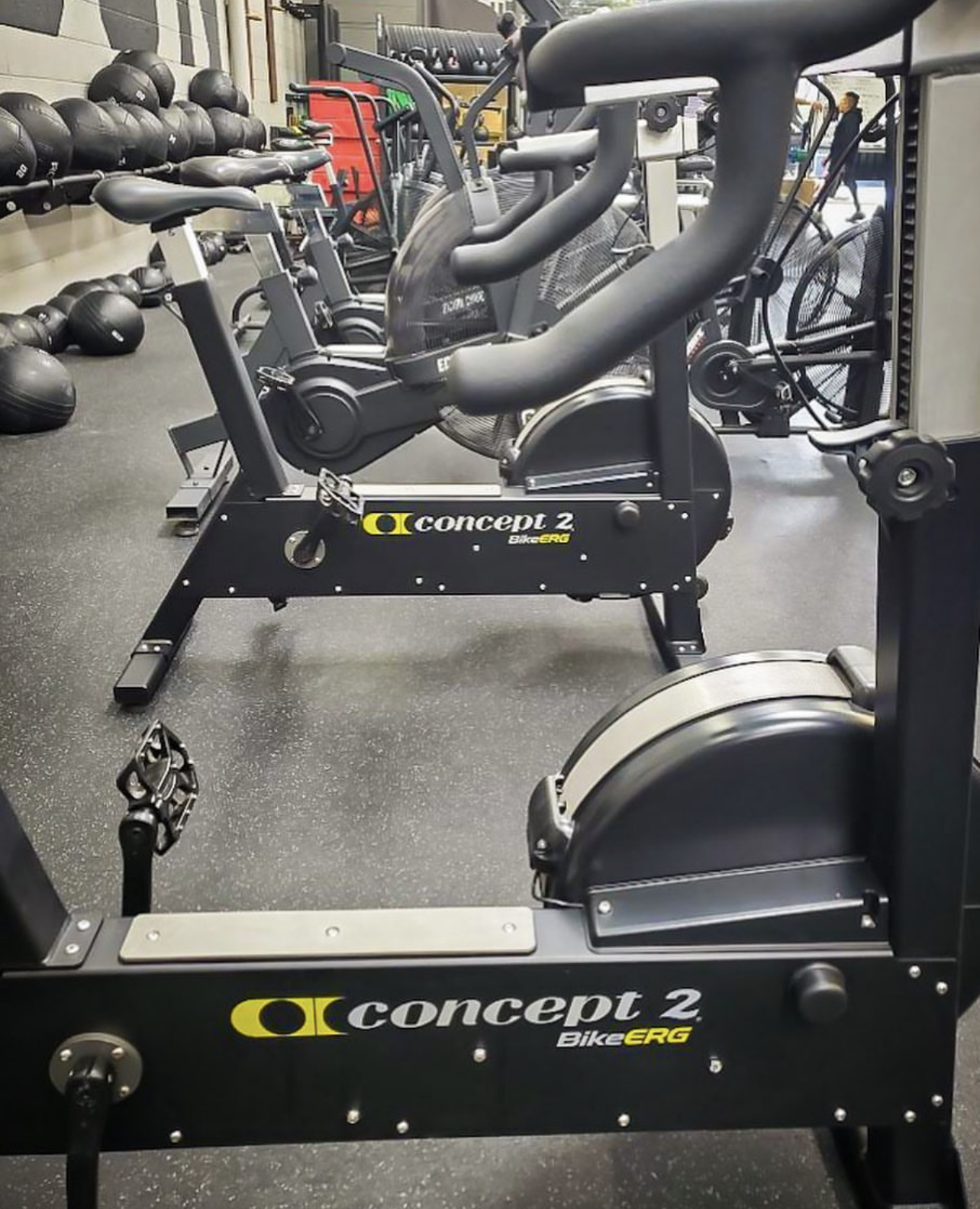 Gym maintenance on a Concept2 BikeErg stationary bike at a gym in Los Angeles